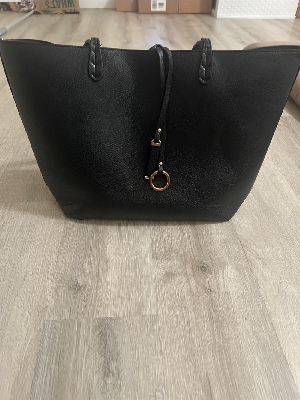 Black Women's Leather Tote Bag with Ring Accent. Includes inside pouch.